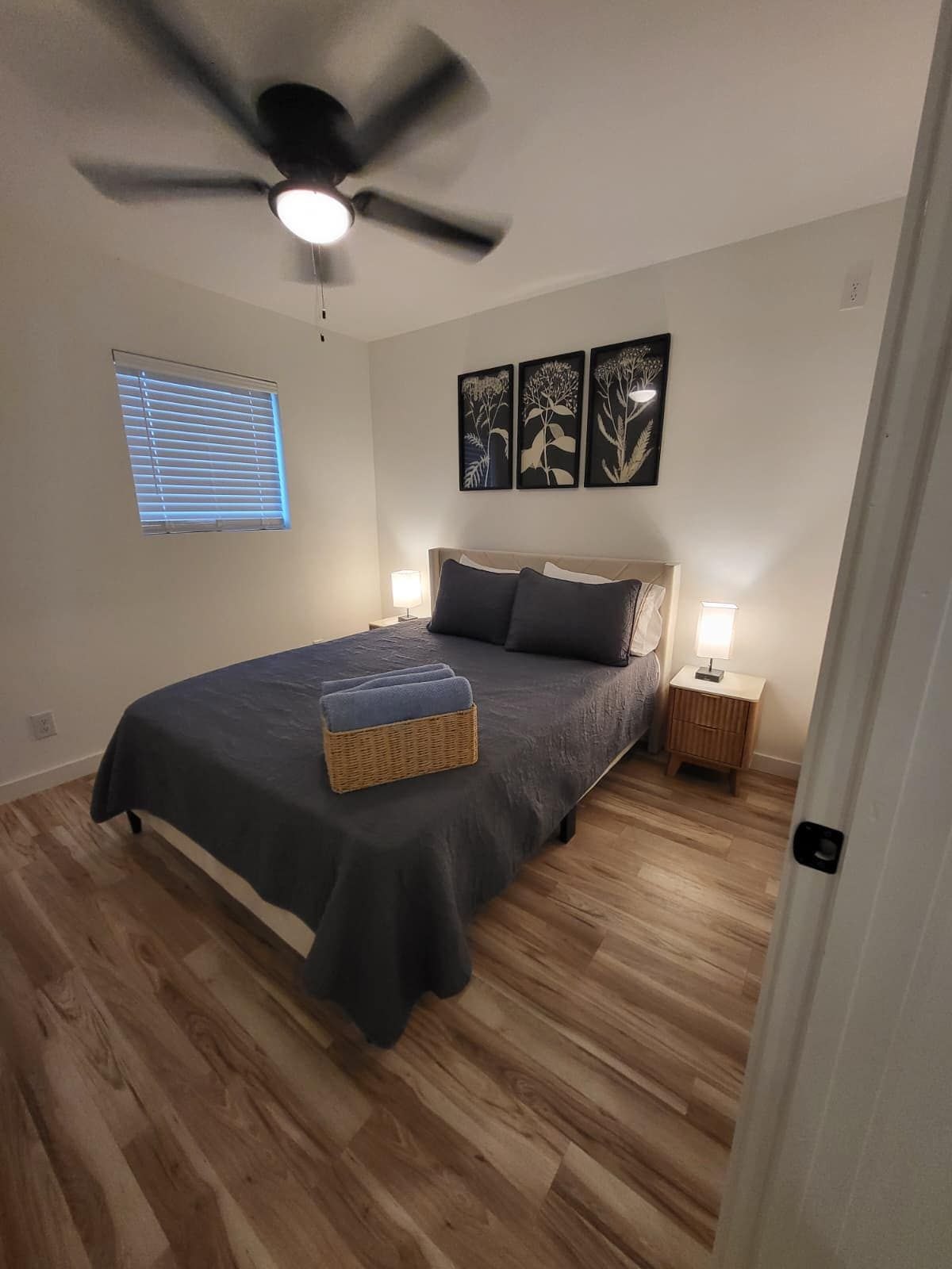 McFadden Pad furnished bedroom with a queen bed and ceiling fan